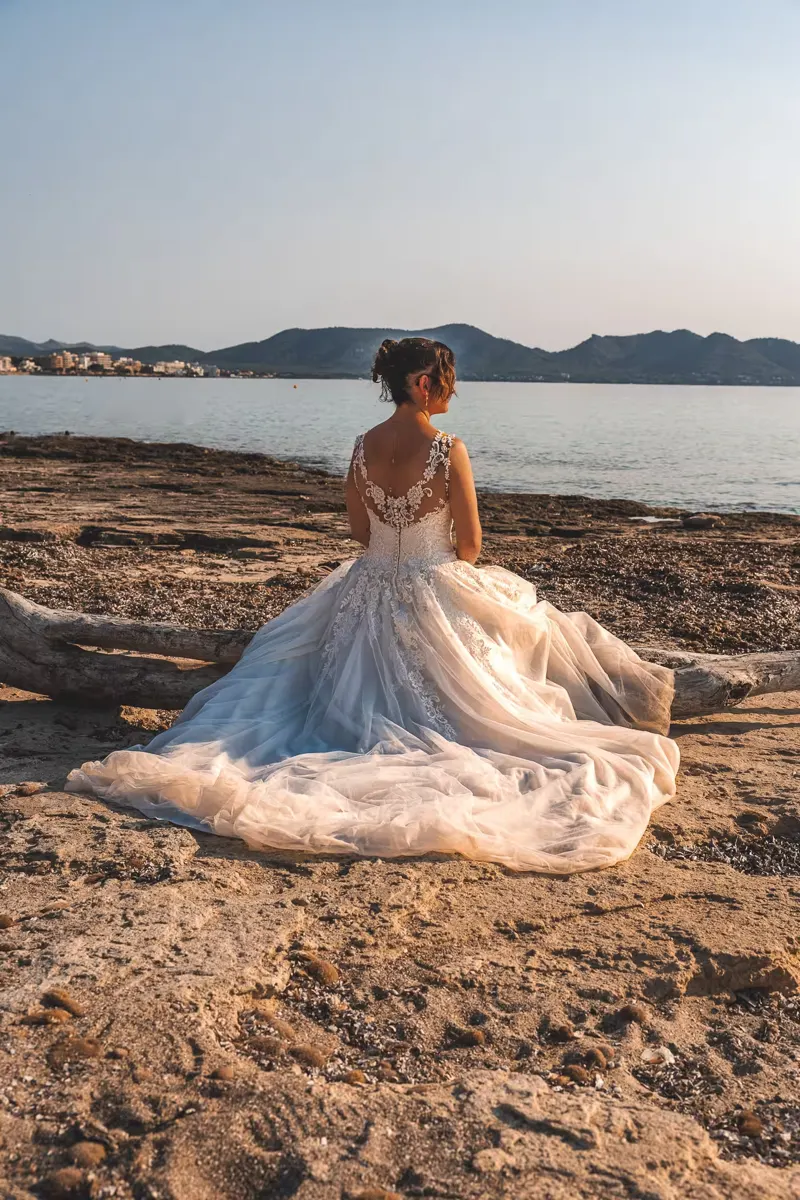 Romantic couple portrait with dramatic sunset sky over the sea