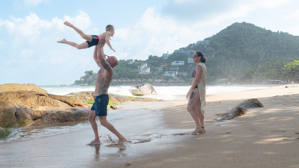Father-son photo shoot in Thailand – playful moment lifting up
