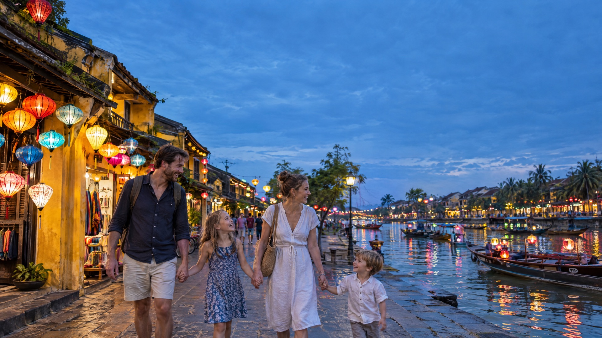 Vietnam photoshoot – family walking under silk lanterns through Hoi An Ancient Town in the evening